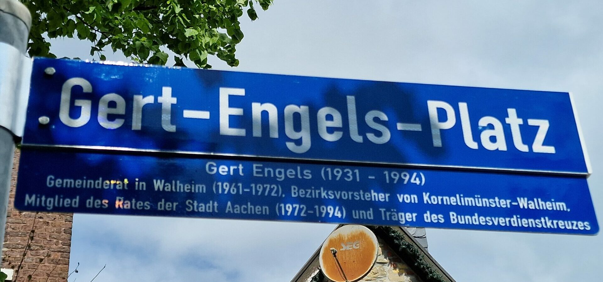 Straßenschild mit Gert-Engels-Platz